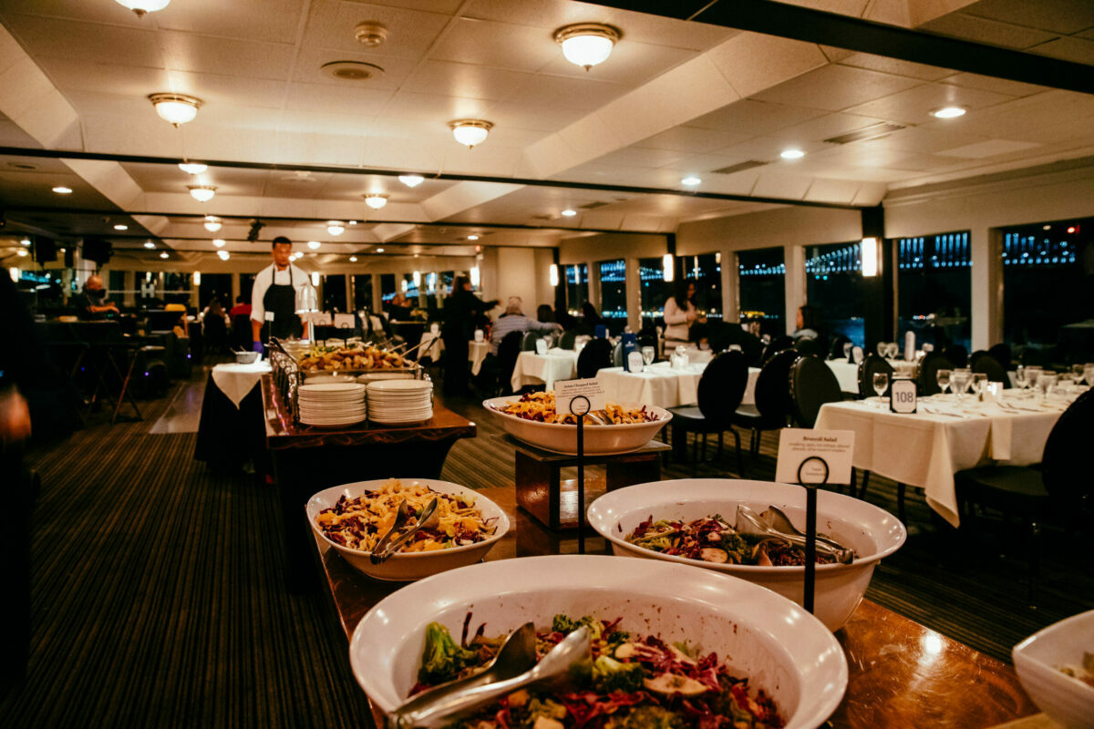 boat dining room with white plates of food