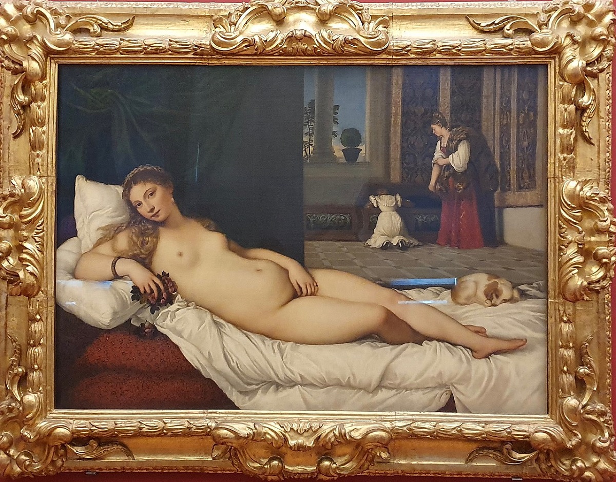 Painting of a woman lying on a long sofa looking at the viewer