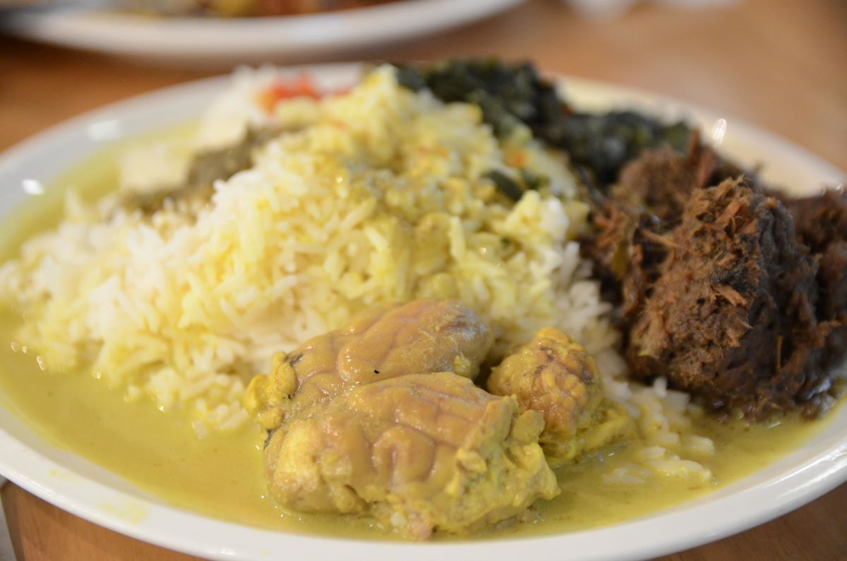 curried lamb brain on a dish with rice