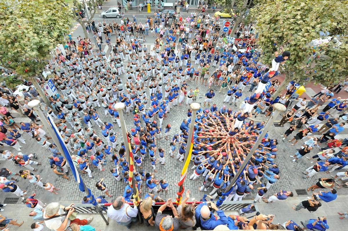 Castellers d'Esplugues creating human pyramids in Barcelona