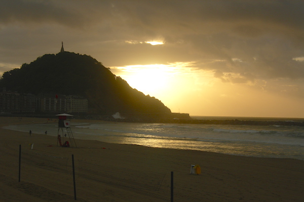 "The Wall" at Zurriola Beach is a popular place to watch the sunset in San Sebastian among locals.