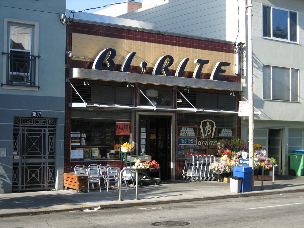 Entrance to San Francisco's Bi-Rite grocery store with shopping carts and produce out front