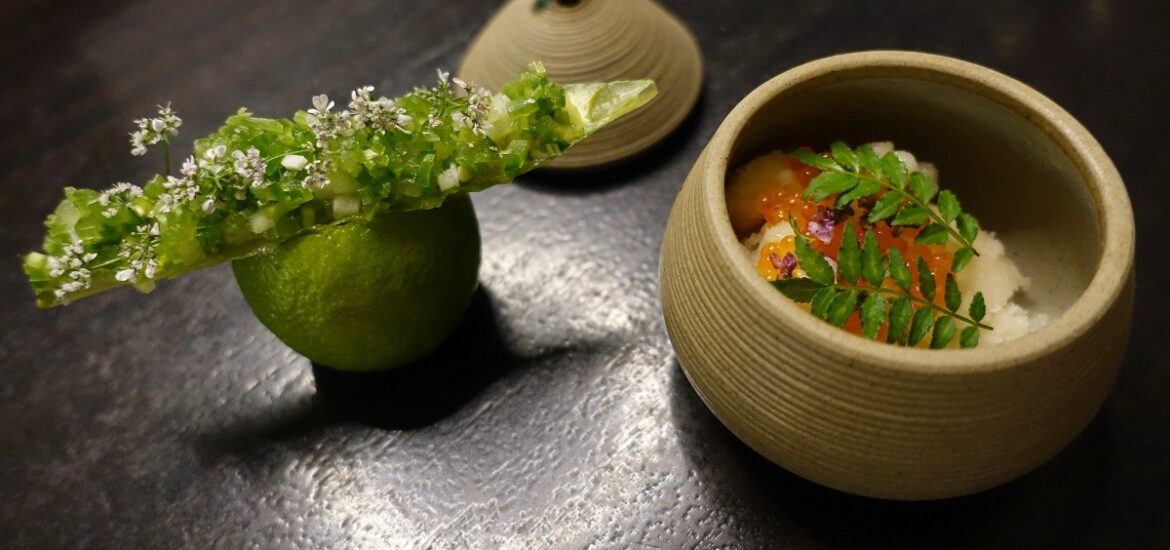 Creative, quirky vegan dishes inside of a lime and clay pot at Alinea vegan restaurant