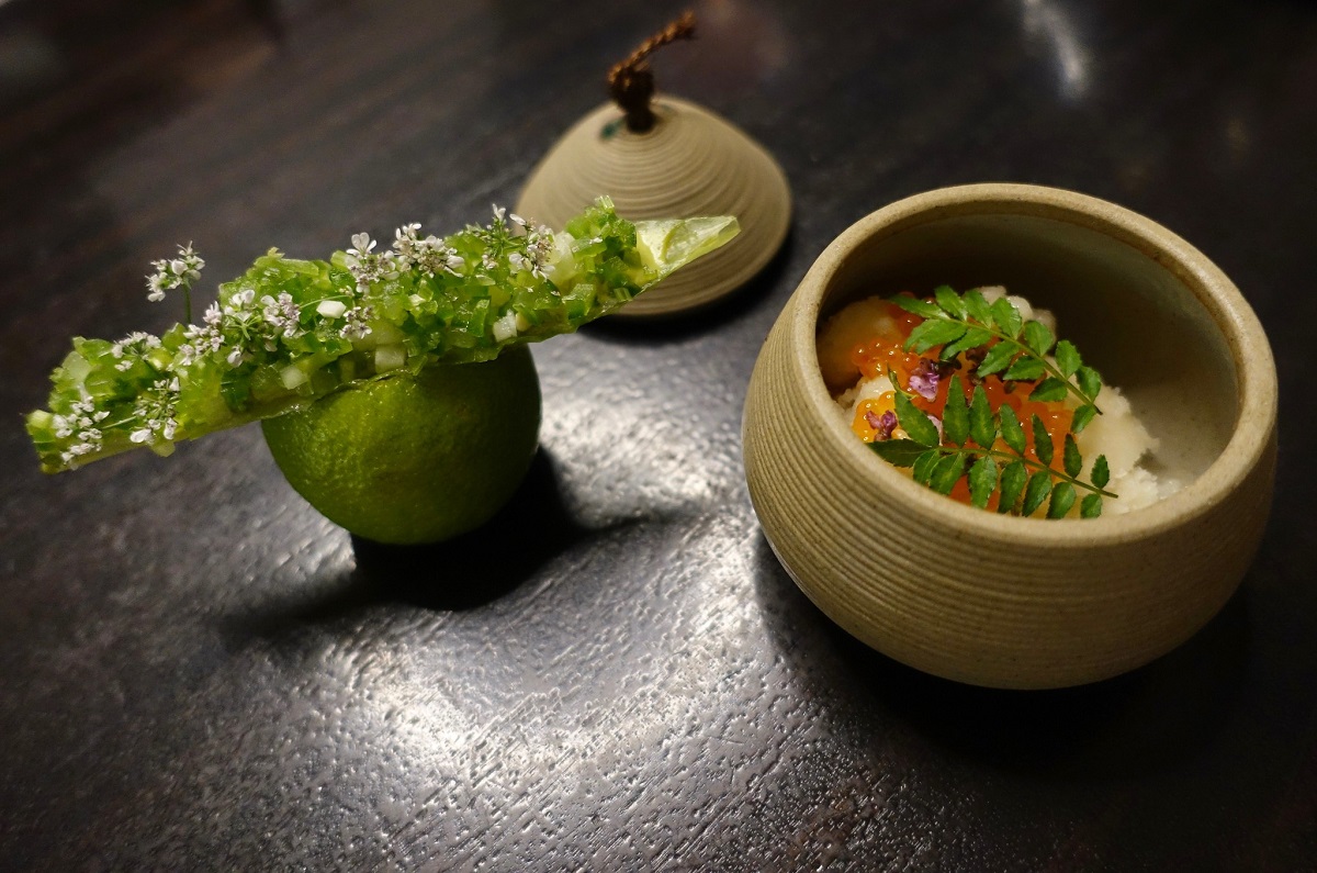 Creative, quirky vegan dishes inside of a lime and clay pot at Alinea vegan restaurant