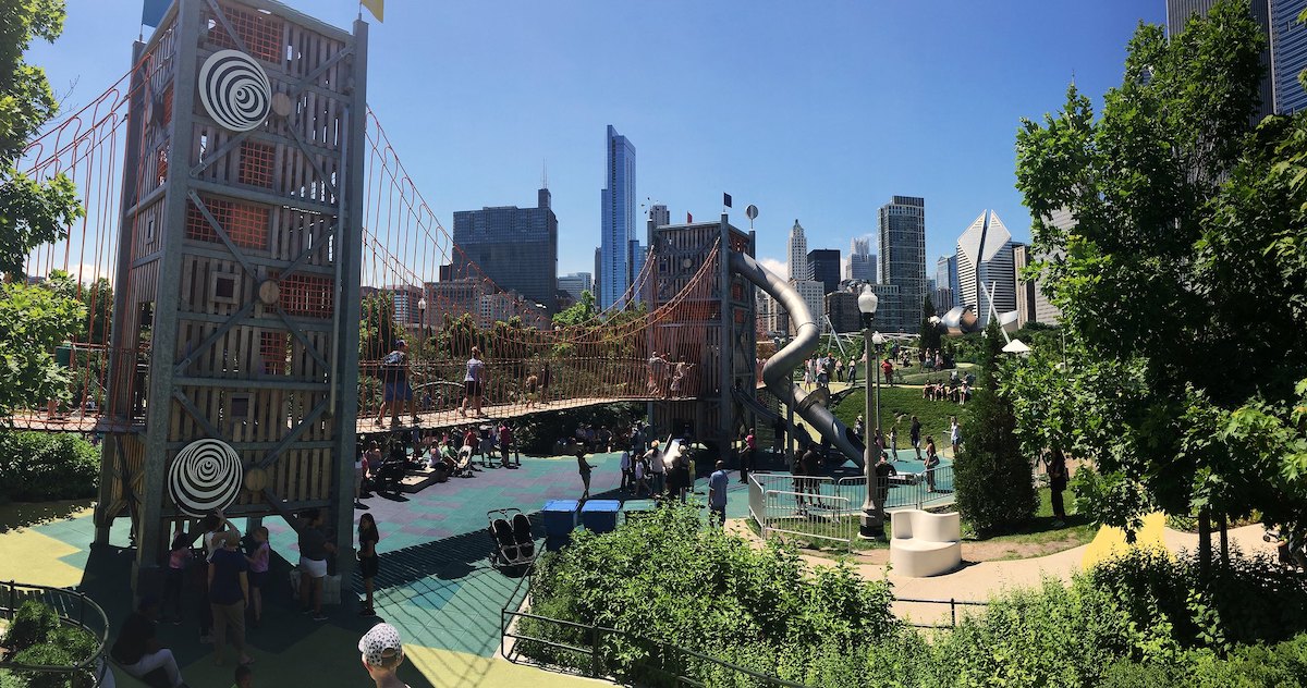 Large playground with the Chicago skyline in the background. Maggie Daley Park is an excellent free place to go in Chicago with kids.