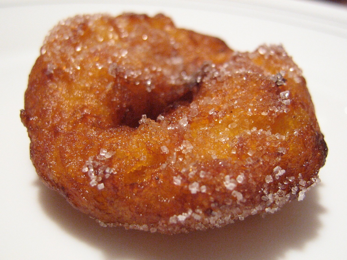 Fried bunyol with sugar, a typical food from valencia