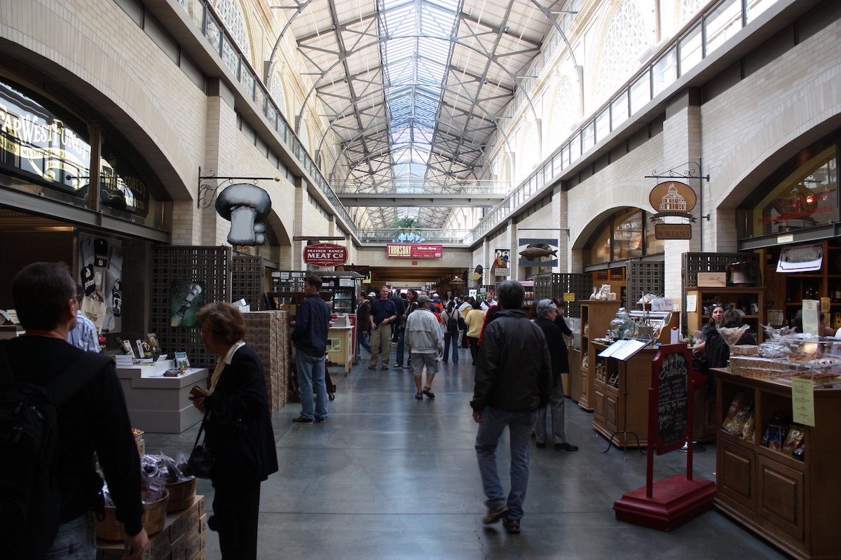 Interior shot of people shopping at the Ferry Building Marketplace in San Francisco