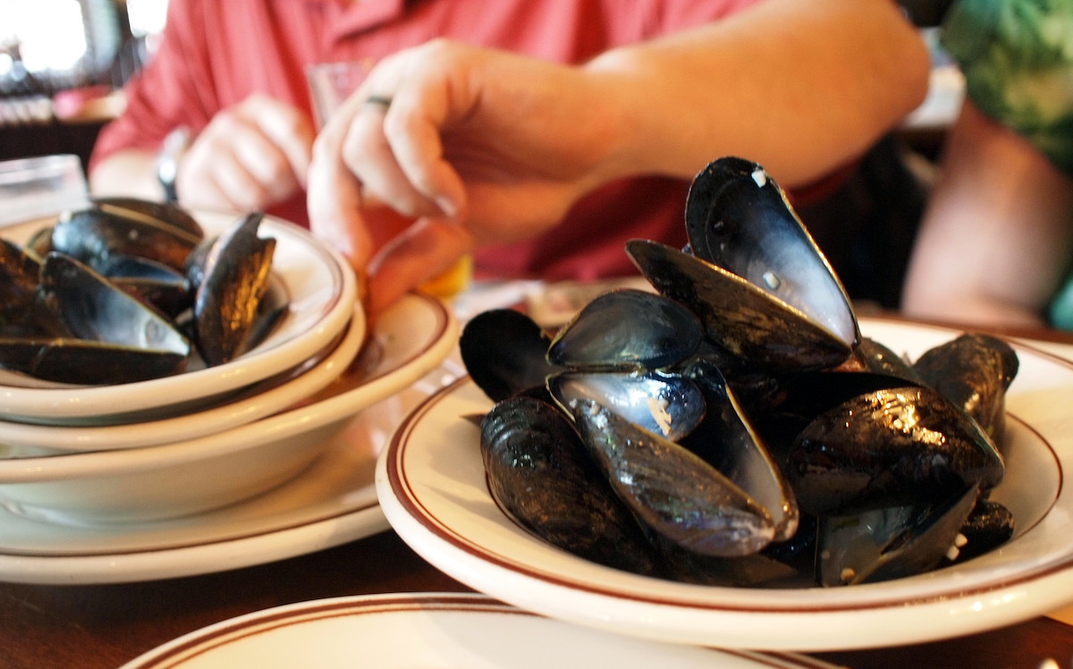 Close up of a plate of mussels shells at the Union Oyster House in Boston