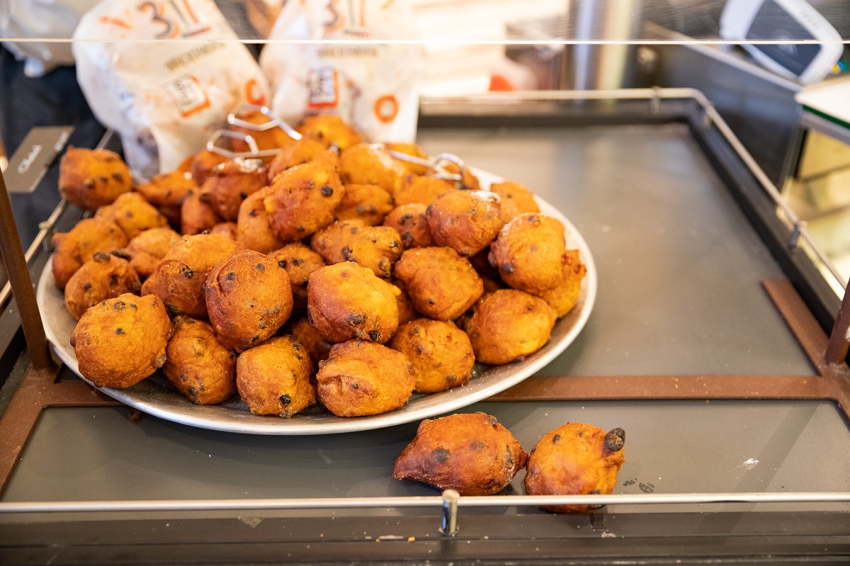 oliebollen at a street food stall in Amsterdam