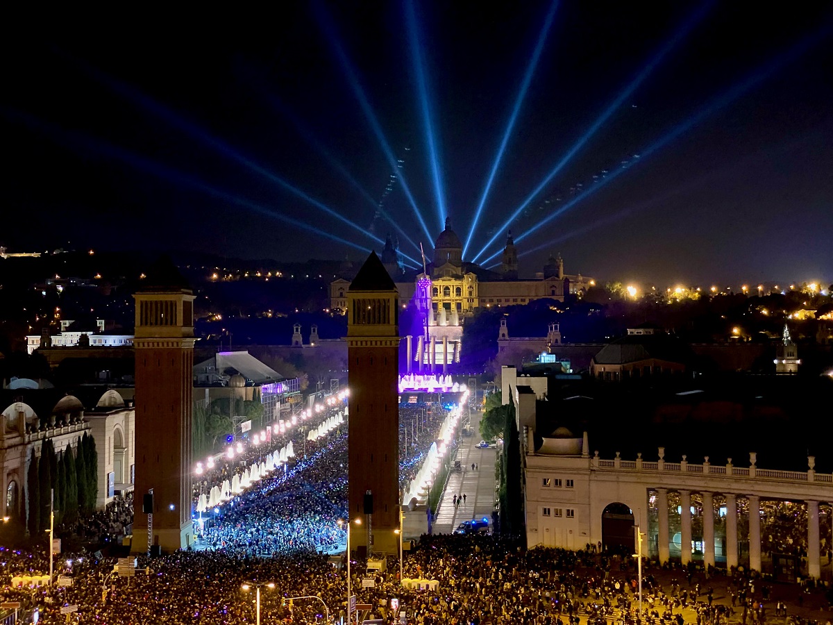 Lights illuminated behind Plaça d'Espanya and the MNAC museum in Barcelona on New Year's Eve