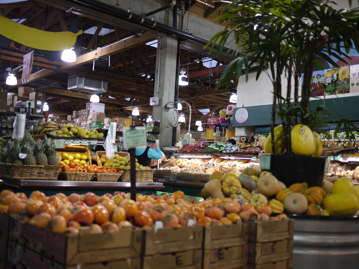 Interior of supermarket in San Francisco with fruit in baskets