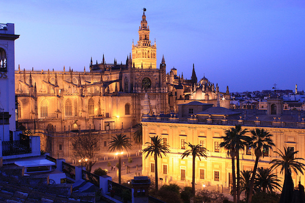 When planning things to do in Seville in June, a visit to one of the rooftop bars for an evening drink and a view like this is a must.