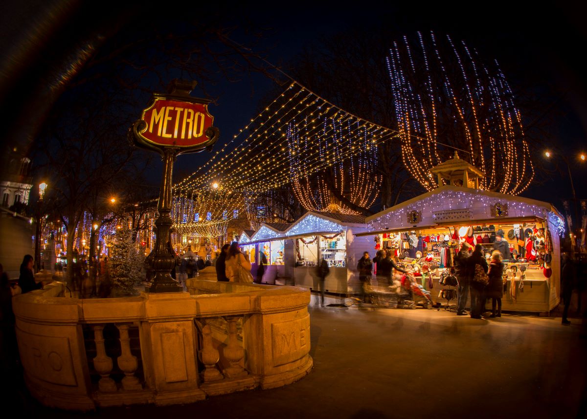 Christmas market in Paris near a metro station. 
