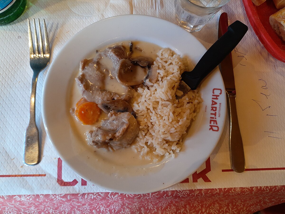 plate of rice, meat and veggies in a Paris restaurant