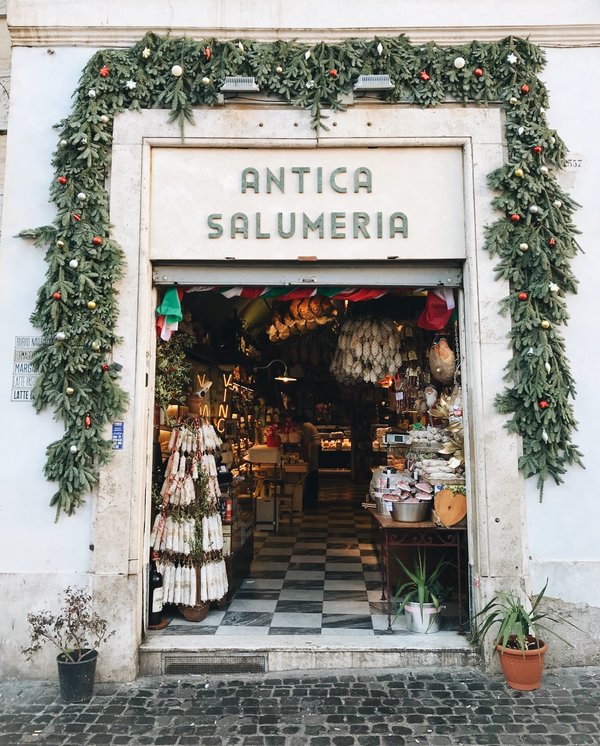 A deli decorated for Christmas in Italy