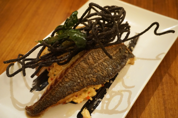 This is a delicious dish of sea bream and creamy rice. It's one of our favorite gourmet tapas in Seville and is not to be missed!