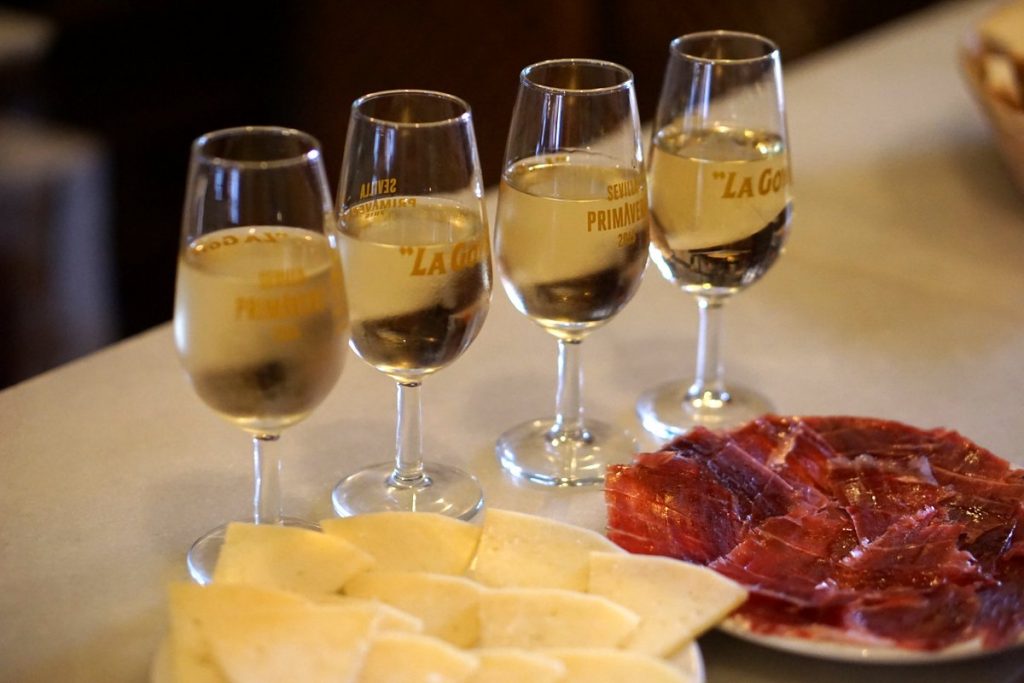 Pairing is crucial when it comes to knowing how to order tapas in Seville, and sherry goes best with ham and cheese!