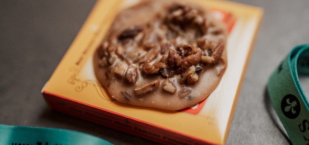Box topped with melted and hardened pecan pralines in NOLA