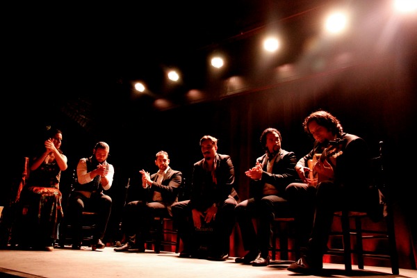 If you're wondering where to see flamenco in Madrid, check out our guide. You'll hear beautiful guitar music like that depicted in this photo.