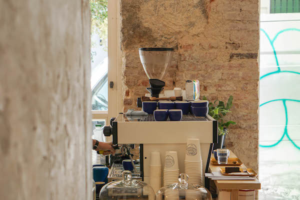 Coffee in Spain is best enjoyed at a specialty cafe, like Hola Coffee in Madrid.