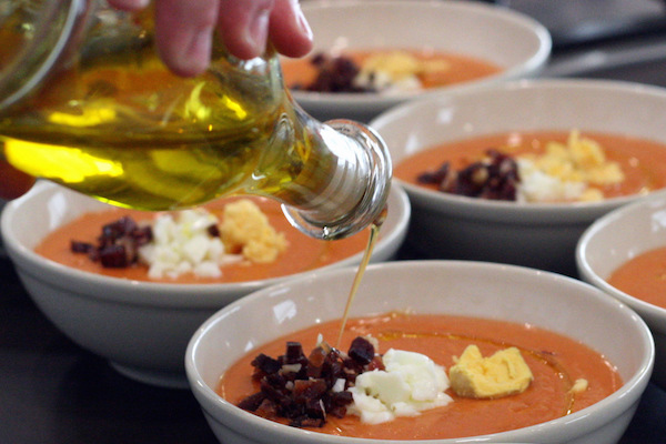 Our Guide to Seville for Foodies recommends taking part in a cooking class where you could learn to make wonderful salmorejo (cold tomato soup) like this!