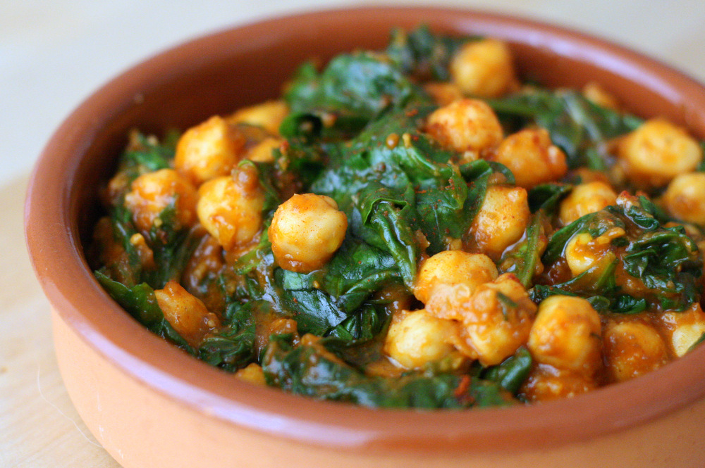 Check out our guide to finding the very best vegetarian food in Seville. Here are the top vegetarian restaurants in Seville where you can enjoy local food! Spinach and Chickpeas is a delicious vegetarian tapa available all throughout Seville!