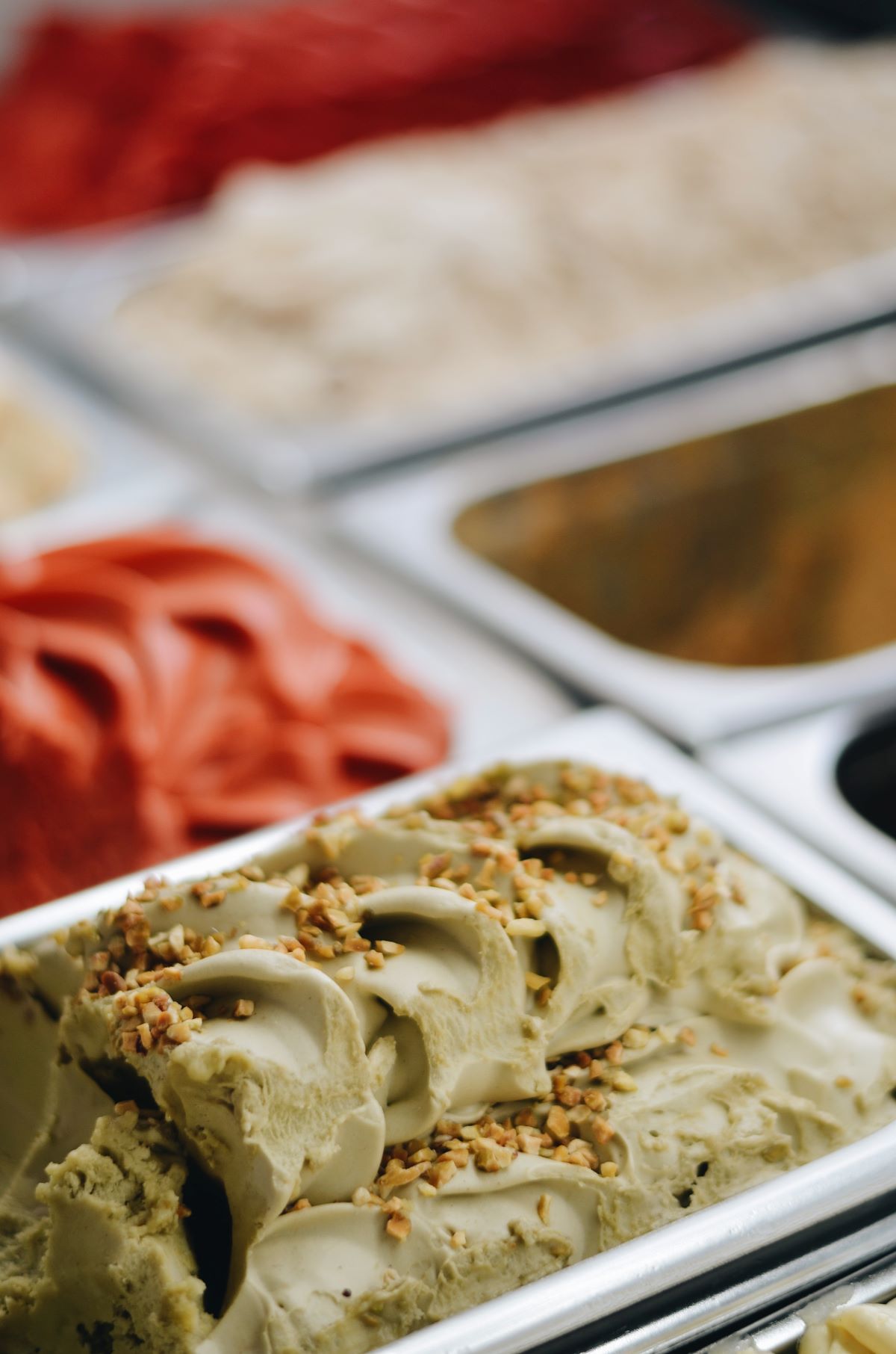 Close up of ice cream counter with different flavors