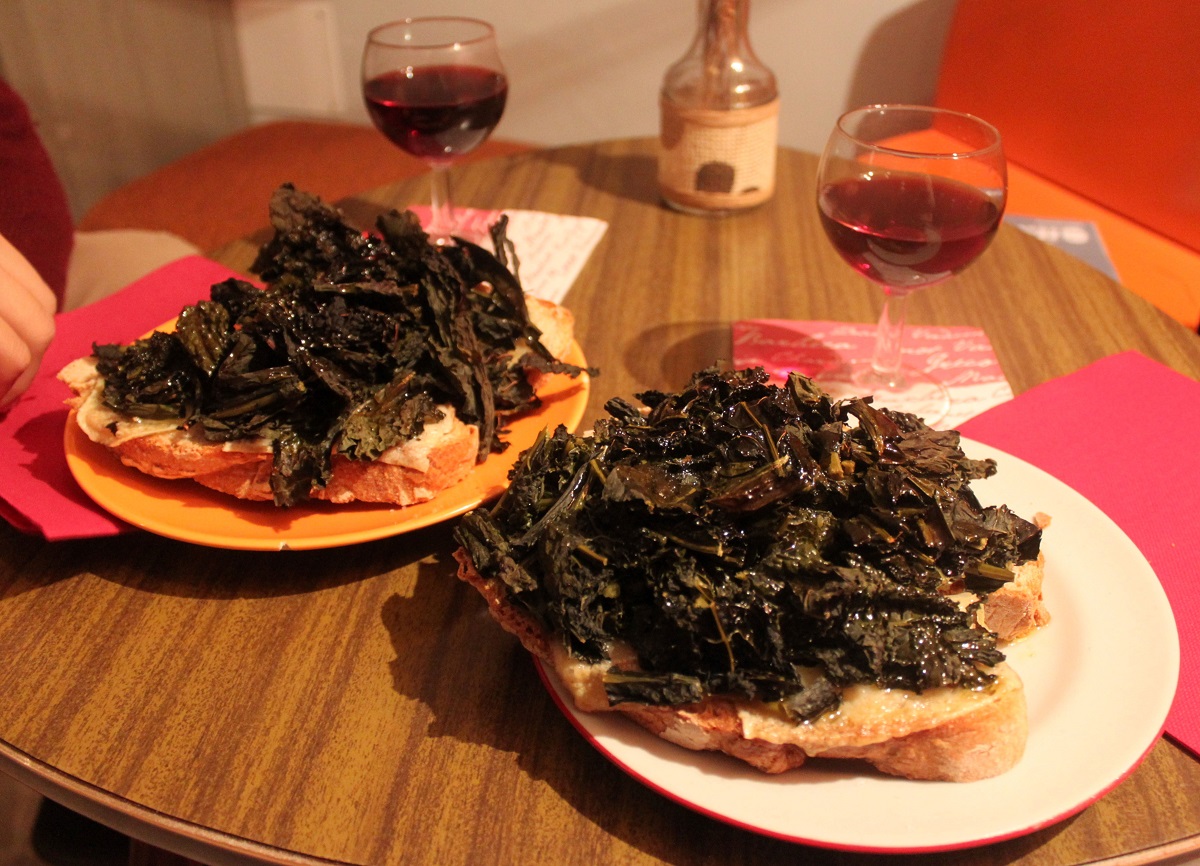 Winter kale and cheese on toast at a cafe bar in Florence, Italy