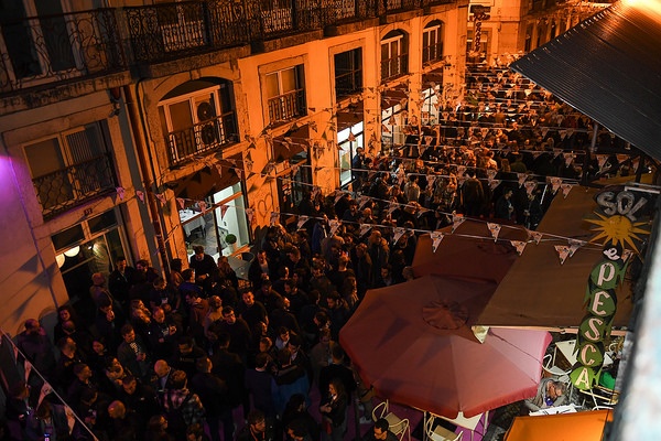 A busy street scene is part of the appeal of Lisbon nightlife.