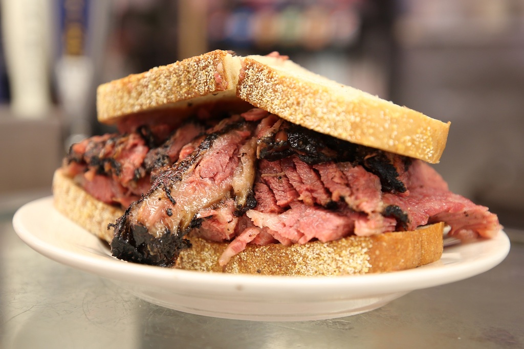 Famous Pastrami on rye sandwich served in New York Deli 