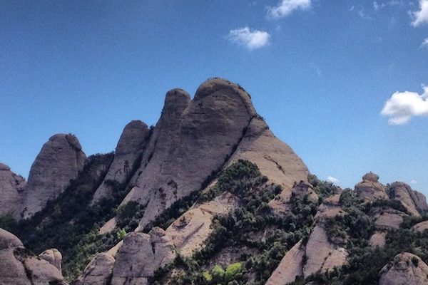 One of the best day trips from Barcelona is Montserrat, a beautiful mountain just 45 minutes away, and one of the best things to do in Barcelona! 