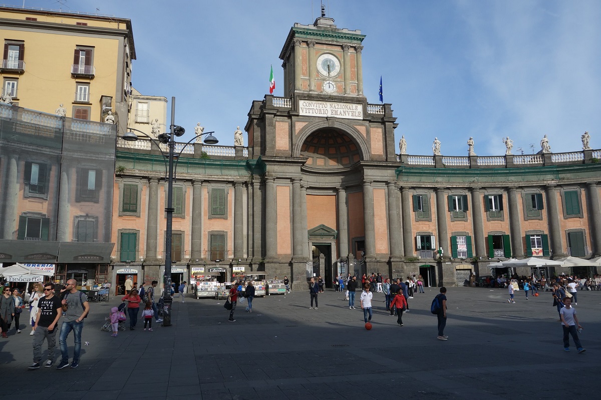 Piazza Dante in Naples during the day with several people walking by