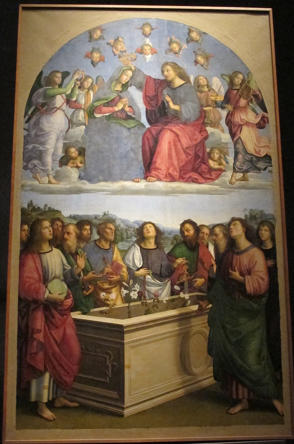 Notice how the upper portion of The Crowning of the Virgin is much brighter, dividing the earthly and heavenly scenes.