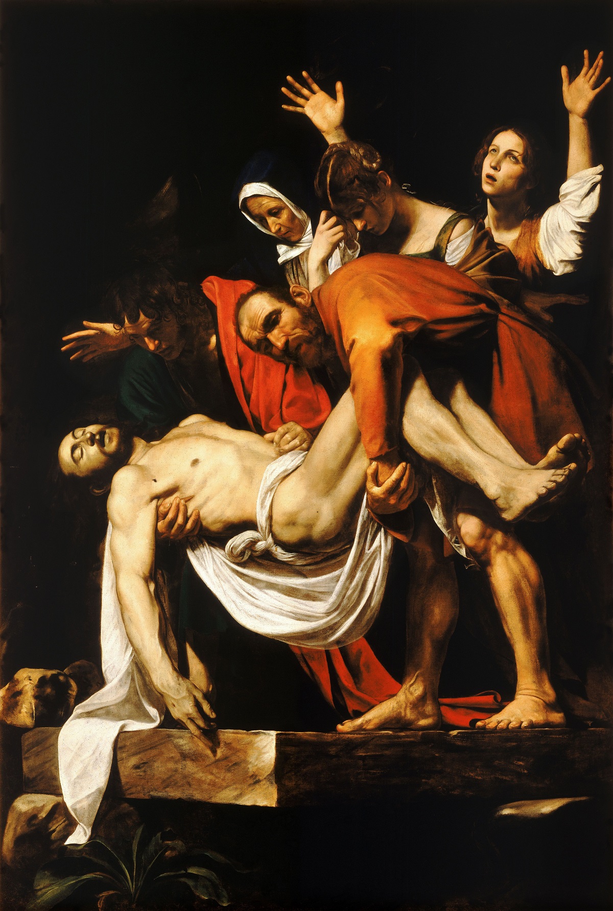 Caravaggio's dark style is on full display in The Entombment of Christ.
