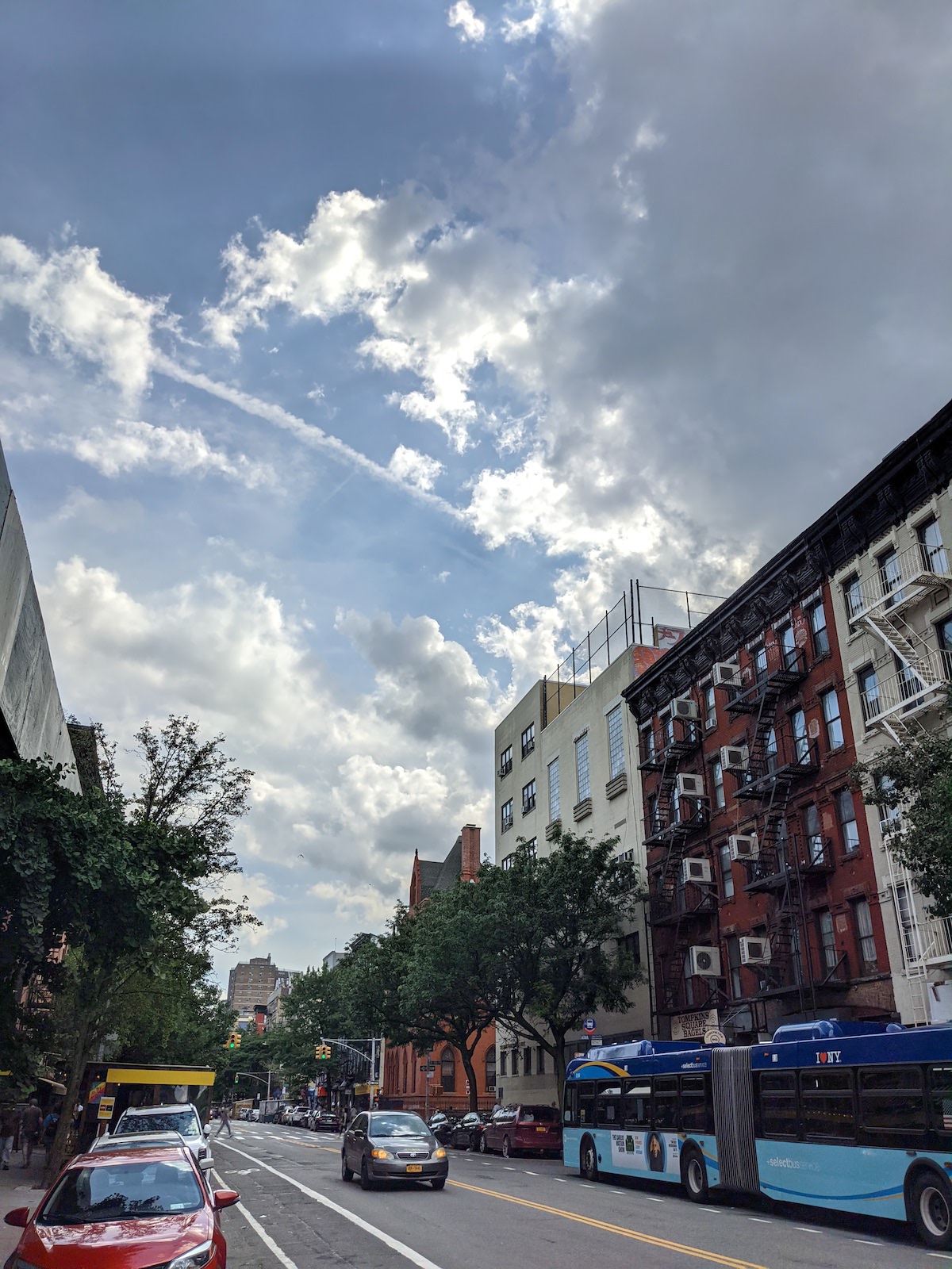 City street on a partly cloudy day