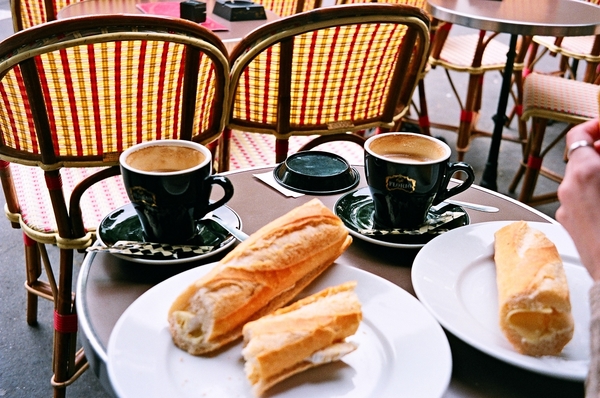 The best baguettes in Paris taste even better when enjoyed at an idyllic Parisian cafe with a cup of coffee.