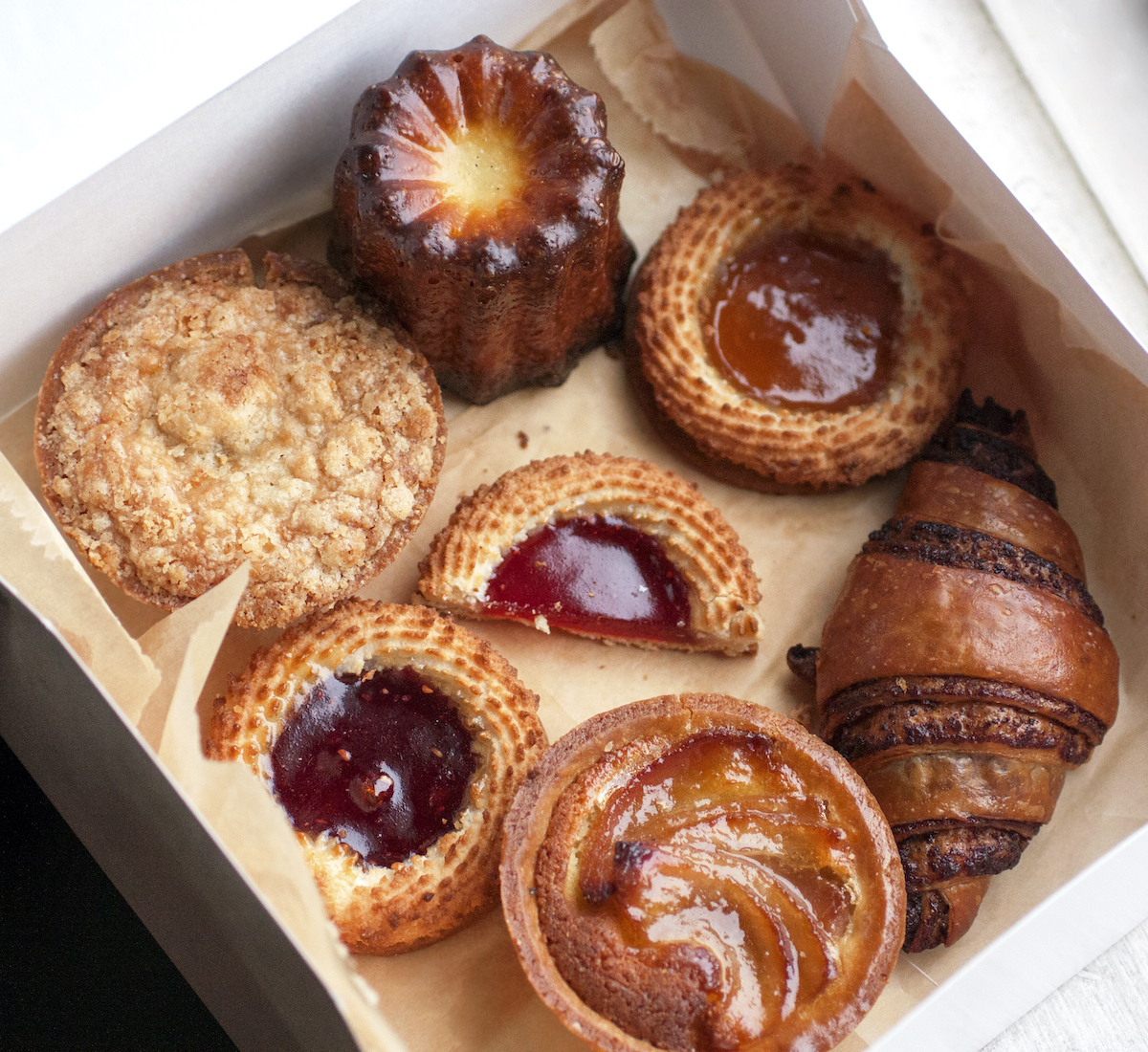 Selection of pastries in a white box