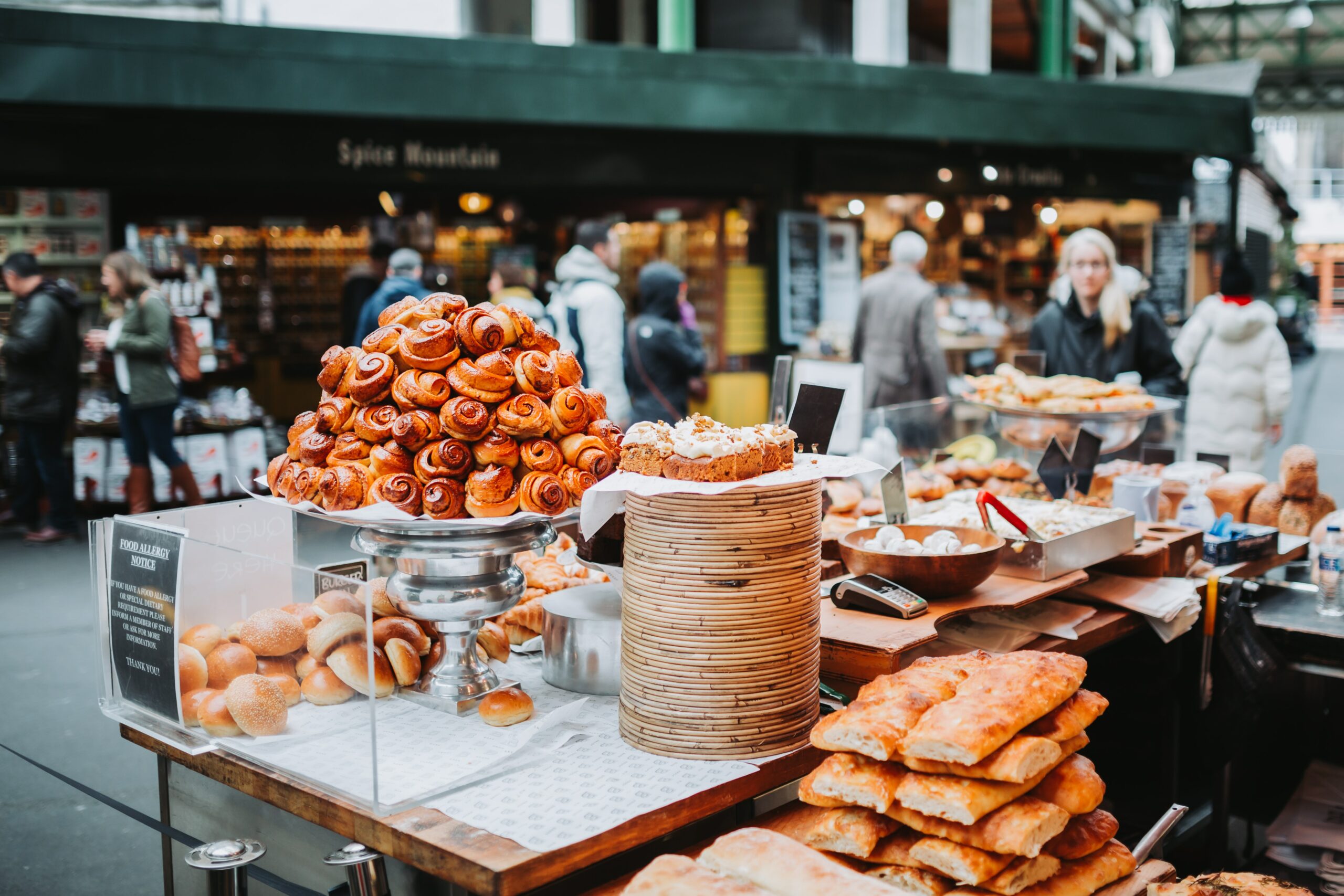 Borough Market bakery stand with cinnamon rolls and buns