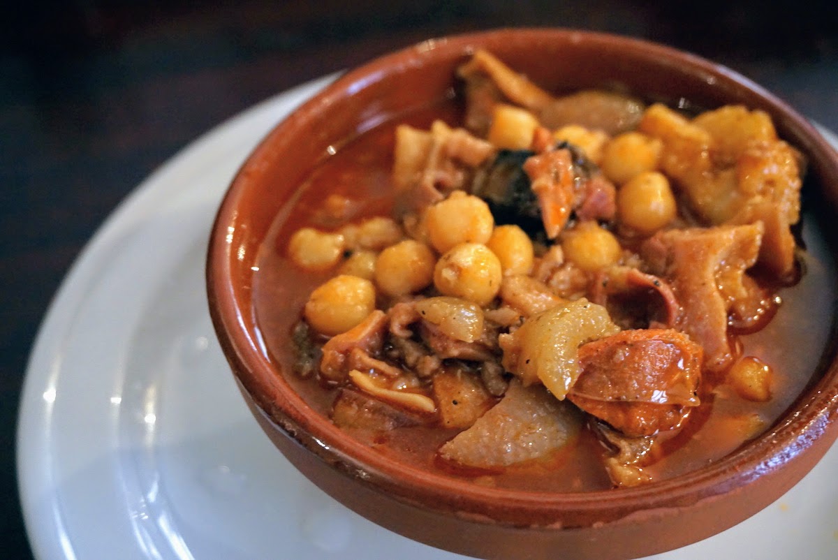 Bowl of tripe stew with pork and chickpeas