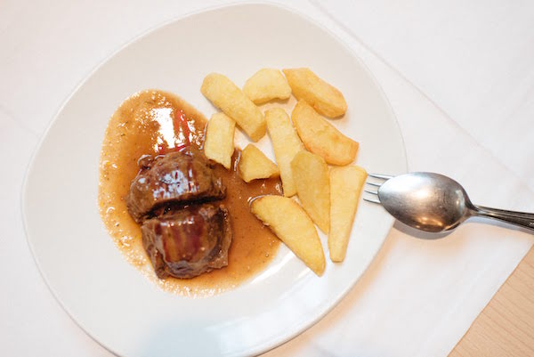 One of our favorite ways to warm up during winter in Madrid is by digging into cozy comfort food, like carrillada!