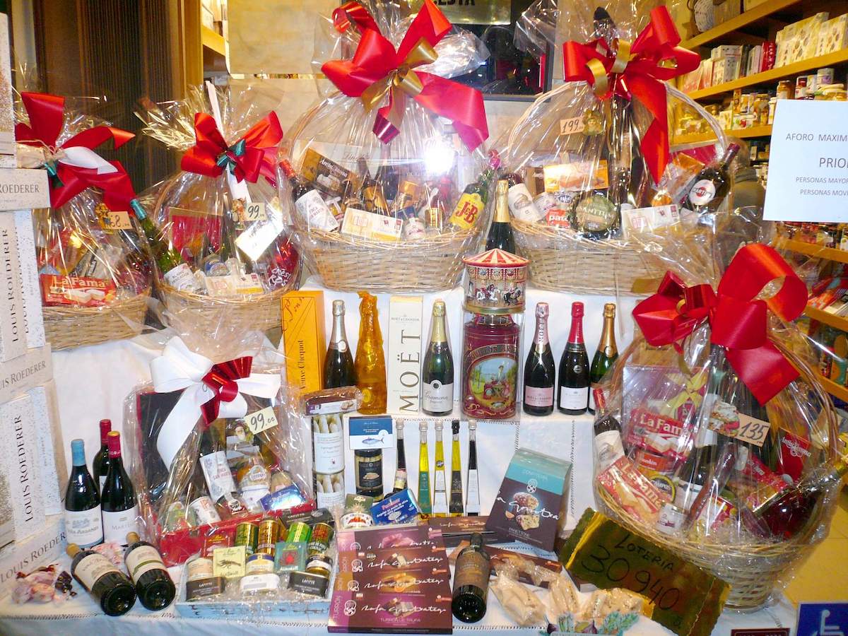 Specialty gift baskets full of gourmet food products on display at a shop