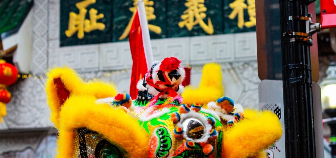 close up of a colorful dragon puppet during a Lunar New Year parade in Chinatown, Boston