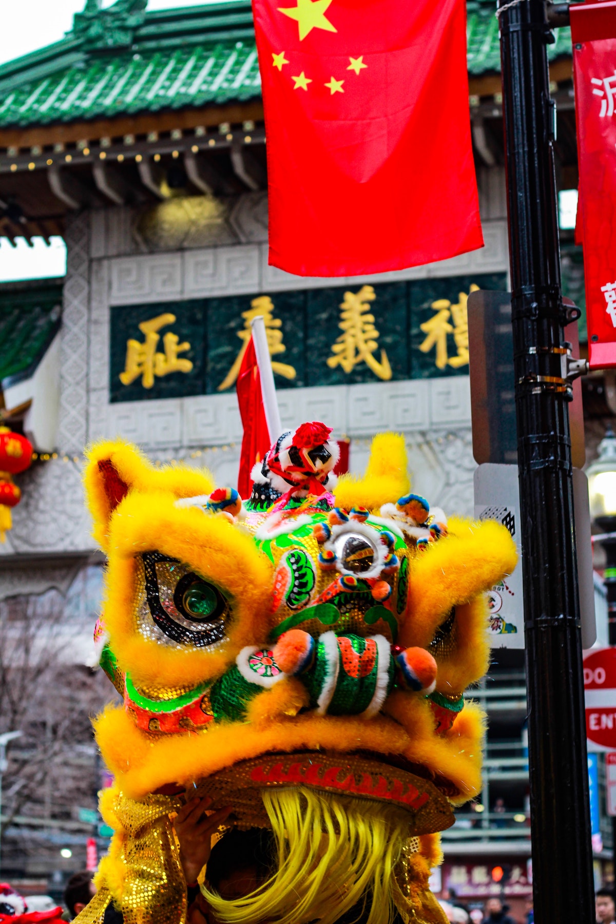 close up of a colorful dragon puppet during a Lunar New Year parade in Chinatown, Boston