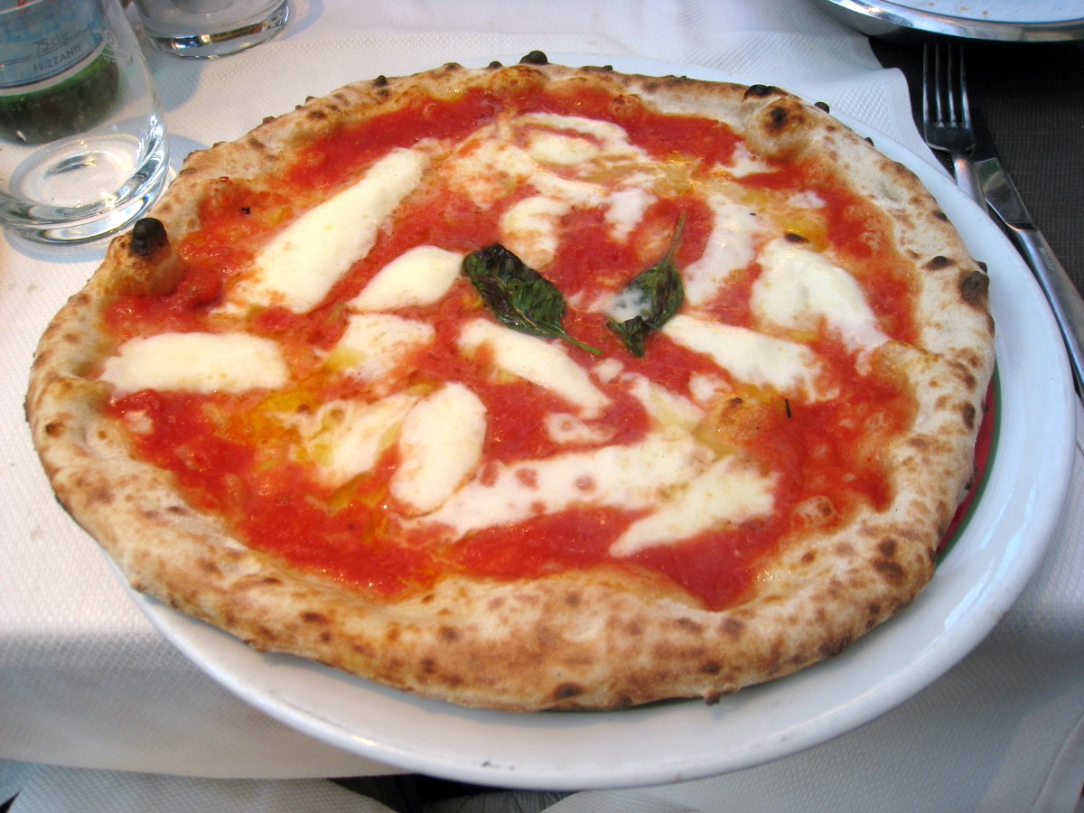 Neapolitan style pizza garnished with basil