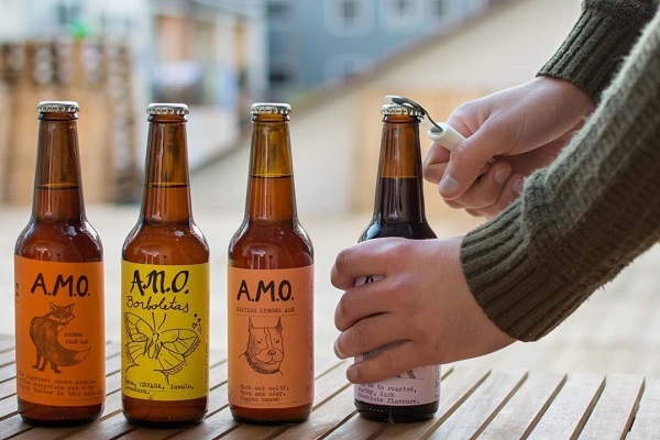 If you want to try craft beer in Lisbon, check out A.M.O. The beer is available on tap or in a bottle, as pictured here. - Portugal food facts
