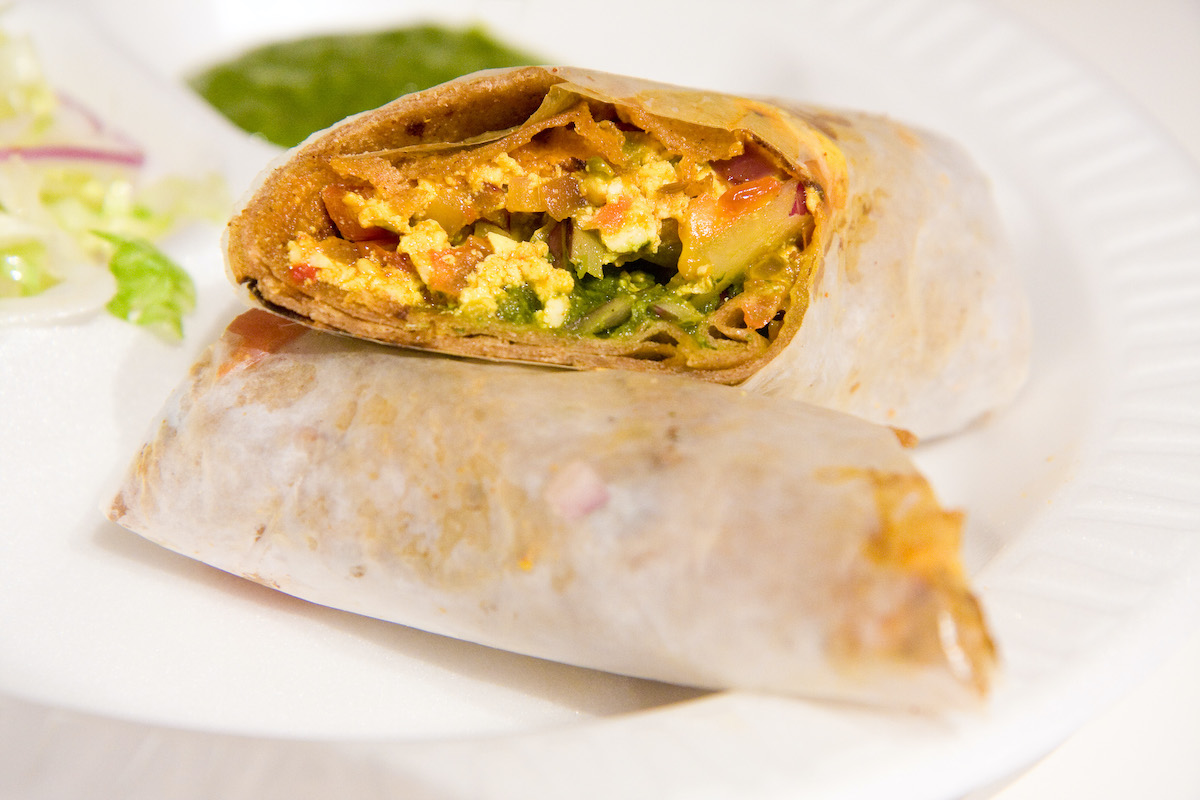 Indian wrap filled with paneer cheese and vegetables