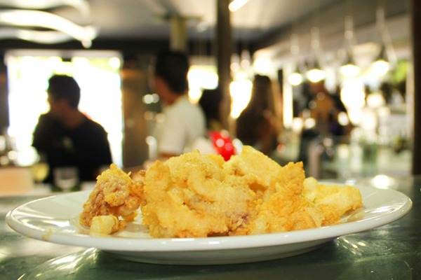A plate of freshly fried seafood is ready to be eaten at Los Diamantes, one of our choices for eating in Granada