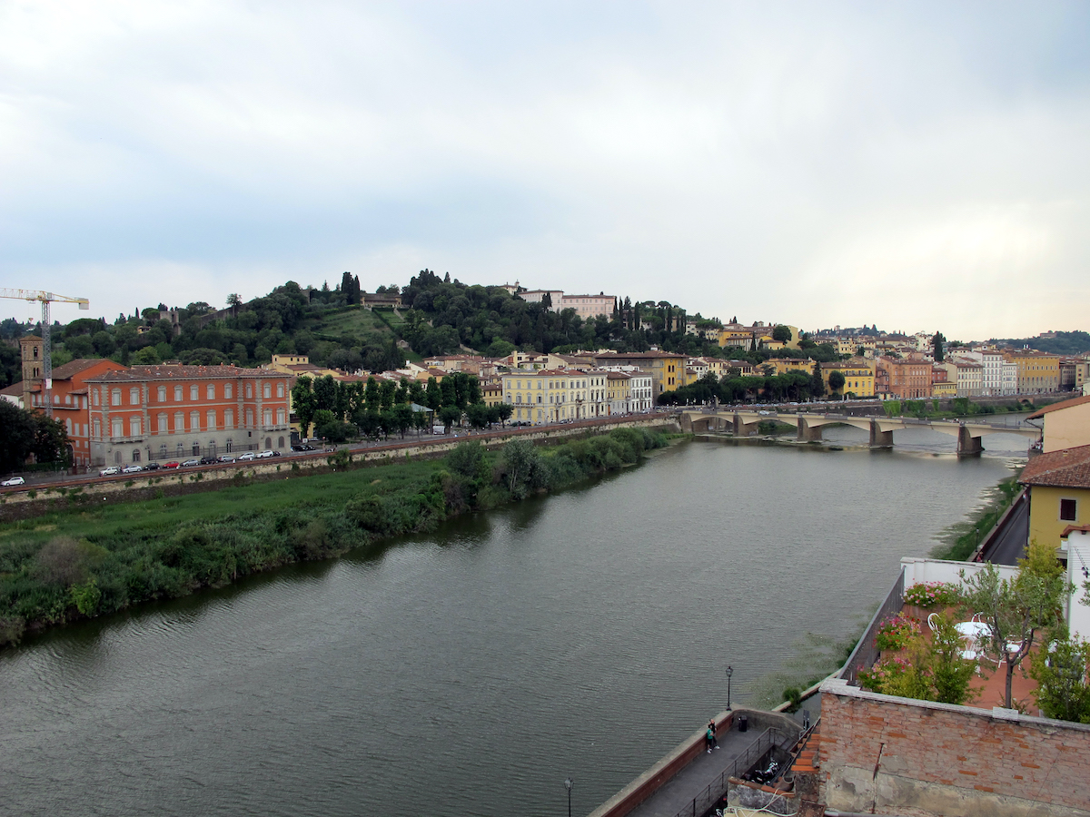 View of the Arno River in Florence from a rooftop bar