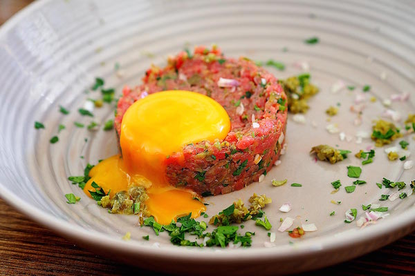 Among the most famous food in Paris is steak tartare, a bistro classic. 