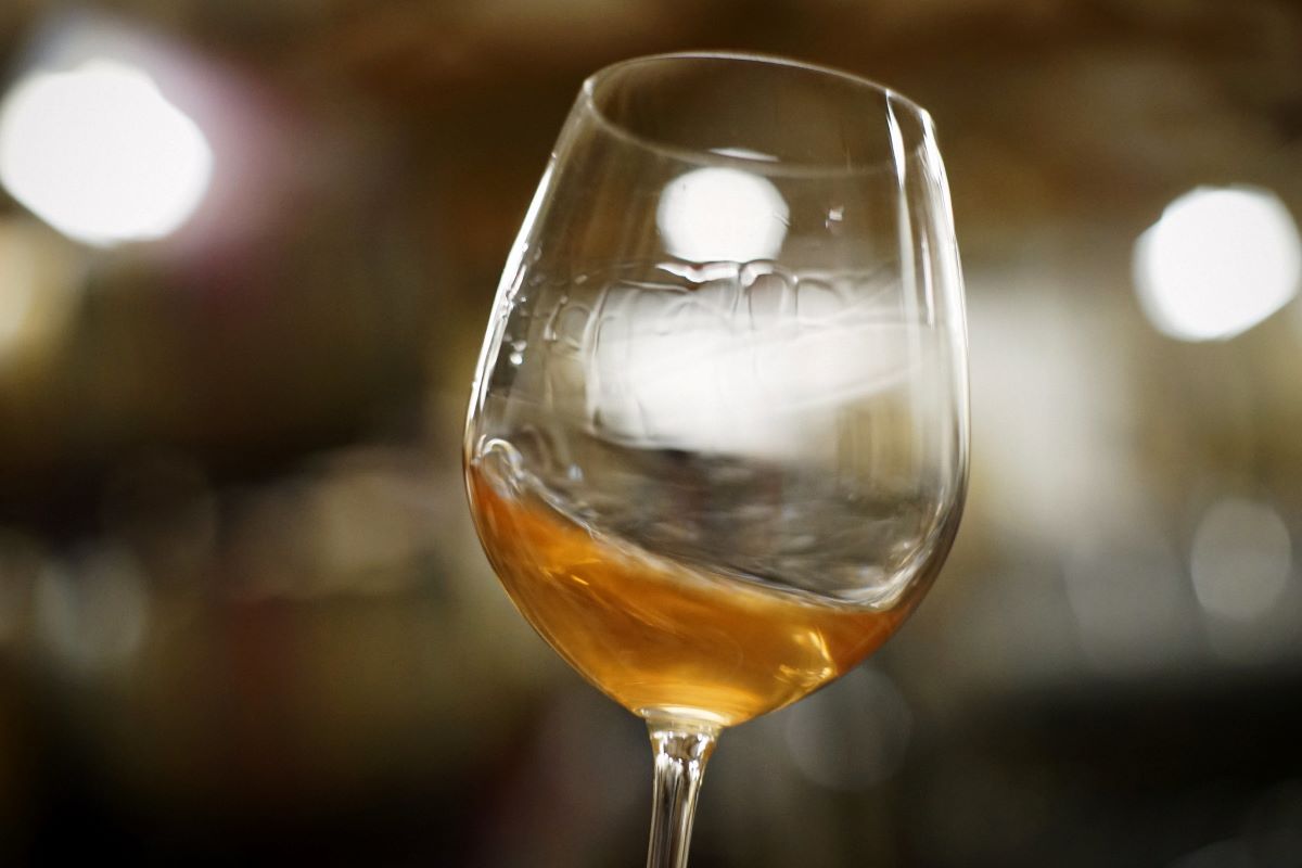 wine glass with orange wine